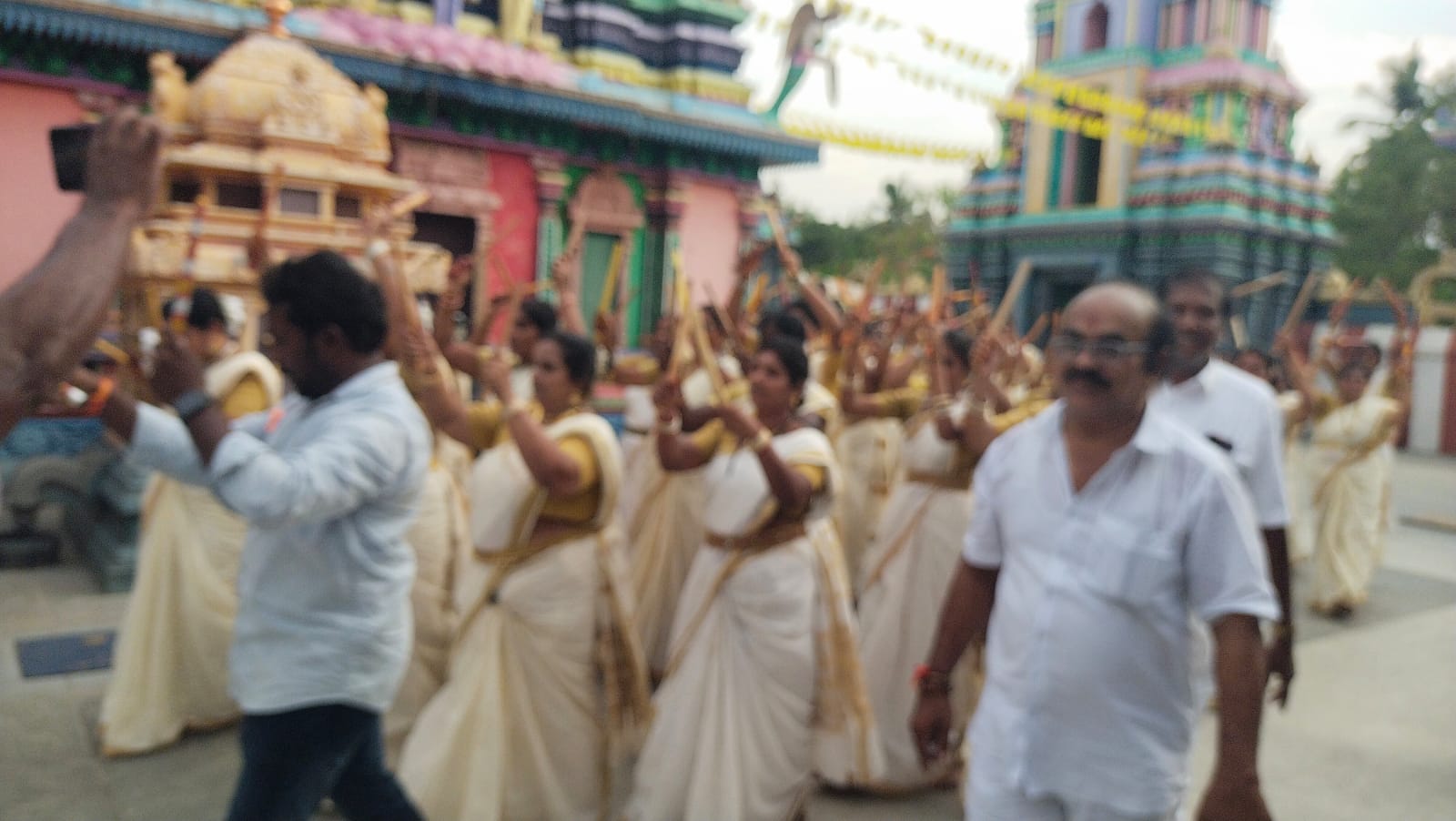 Large temple chariot moving through the street
