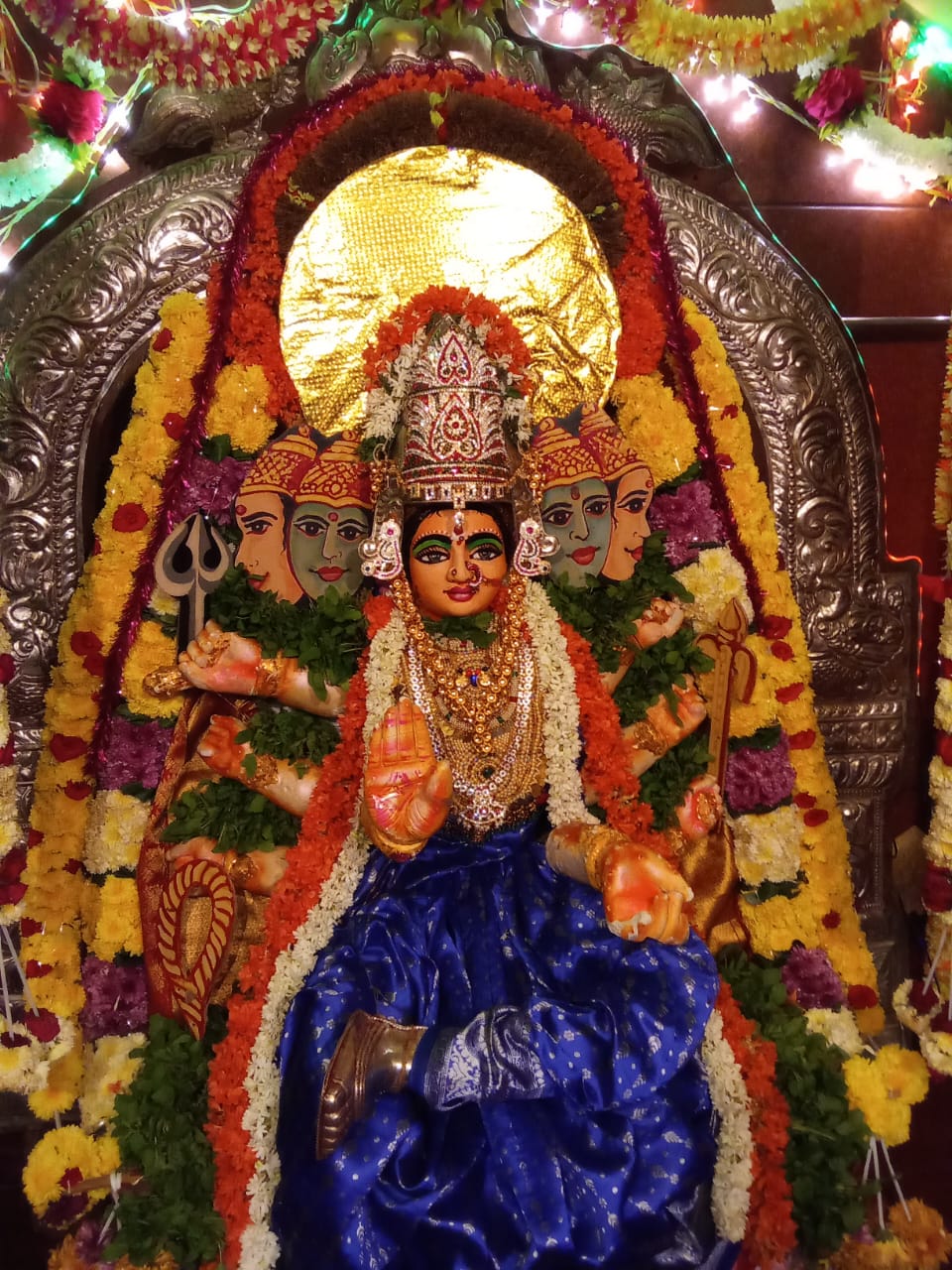 Traditional temple procession with devotees