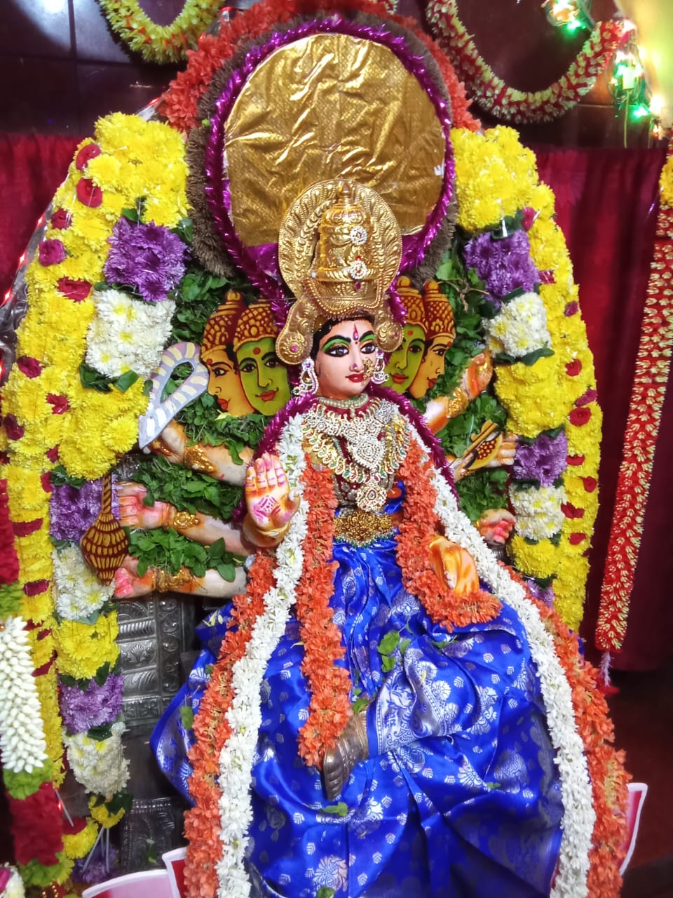 Traditional temple procession with devotees