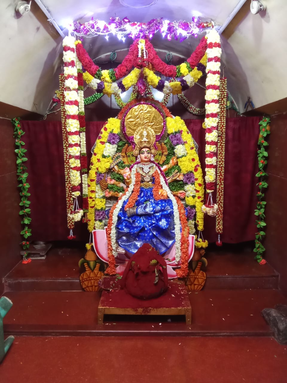 Temple deity and shrine prepared for worship